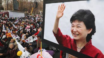 S. Koreans demand leader's removal in New Year's Eve protest