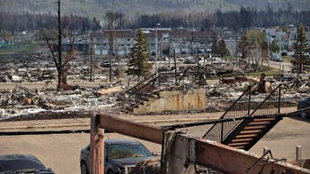 Wildfire raging in Alberta has spread into Saskatchewan