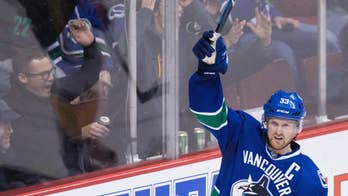 Henrik Sedin gets winner for 999th point, Canucks beat Preds