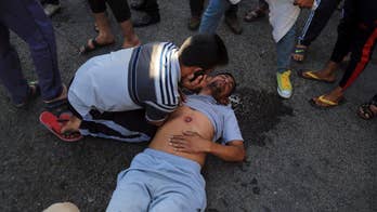 Iraqi protesters storm Baghdad's Green Zone, shooting erupts