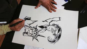 Iraqi artist protests Trump ban with graffiti