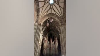 Church bell ringer thrown in the air after getting foot caught in rope, rescuers say