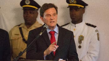 Fed up with politics, Brazil cities swear in outsider mayors