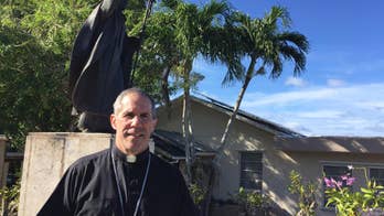 Guam archbishop: Settlements promising end to abuse lawsuits