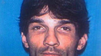 One suspect arrested, one at large in basement murders of Massachusetts couple