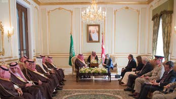 May visits Saudi Arabia without headscarf