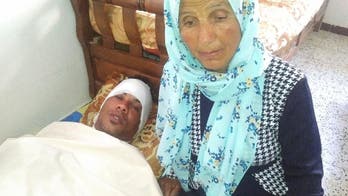 Tunisian vendor's immolation echoes growing desperation