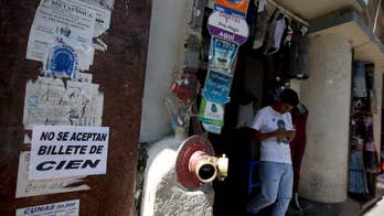 Venezuelans scramble as most-used banknote becomes void