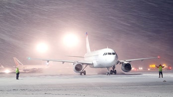 Airlines cancel thousands of flights as nor'easter slams East Coast