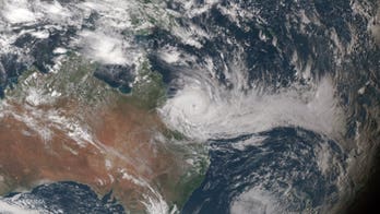 Cyclone Debbie: 'Idiot' caught surfing in giant storm