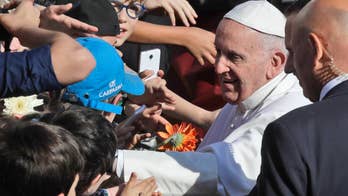 Pope comforts sister of French priest slain by extremists