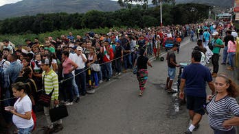 Escape from Venezuela: Colombia border crossing mobbed as starving citizens flee