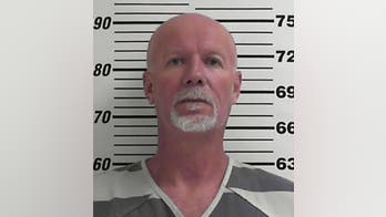 The Latest: Dad, son could face death in rail worker slaying