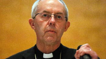 Anglican leader says DNA tests have revealed his real father