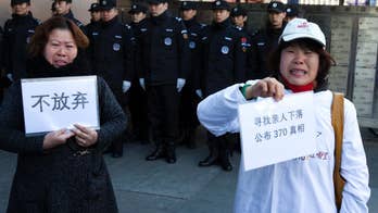 Australia, Malaysia hope MH370 will be found one day