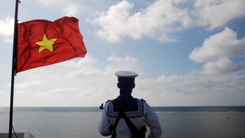 China condemns Vietnam's extension of runway on disputed South China Sea island