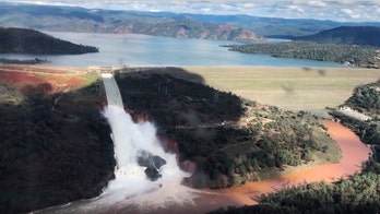 Officials order evacuations of areas near California dam