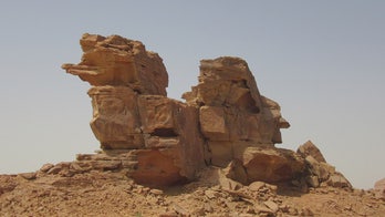 Who created these strange, ancient sculptures hidden in the Saudi desert?