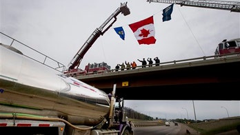 Residents make first return to fire-damaged western Canadian oil city