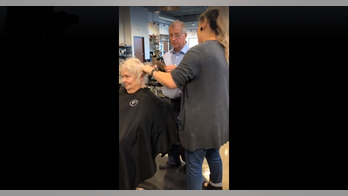 Viral video shows Texas man learning how to style wife's hair