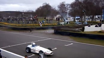 Driver flips into pedestrian tunnel in classic Grand Prix race