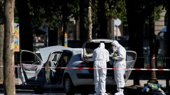 Champs-Elysees attacker was questioned in Turkey over large cache of weapons, prosecutor says