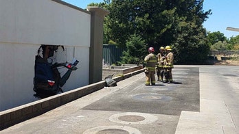 Out of control driver smashes through Taco Bell drive-thru and laundromat wall