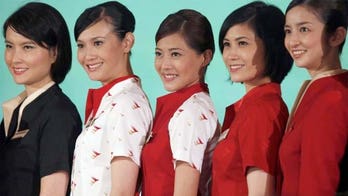 Cathay Pacific cabin crew say that uniform is too revealing