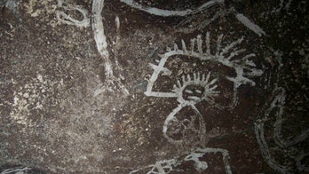 Mysterious rock art uncovered in caves on uninhabited Caribbean island