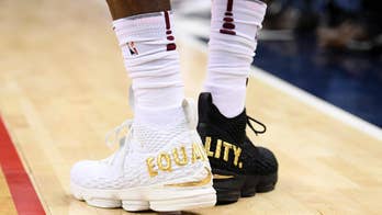 LeBron James sends message with black and white shoes, speaks about Trump