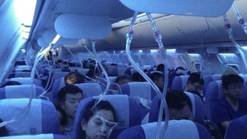 Officials say vaping co-pilot caused Air China flight to drop 21,000 feet