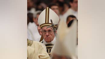 Pope off to maximum-security prison for foot washing ritual