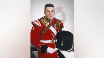 British police hunt for 2 accused of trying to kidnap serviceman