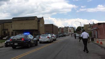 Man shoots father at Baltimore church after brother's funeral, cops say