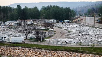 Residents return to fire-damaged western Canadian oil city