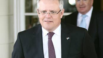 Australian official rejects criticisms of China investor ban