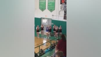 Lone cheerleader joined by rival squad in heartwarming video