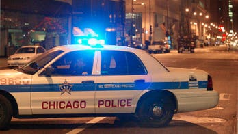 Four gunmen open fire on group in Chicago, killing 1, wounding 6, police say