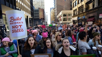 Tens of thousands of protesters spill into Chicago's downtown