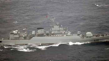 China building 'great wall of sand' in contested waters, US official says