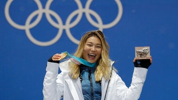 Olympian Chloe Kim jokes that she didn’t cry after winning gold because she wanted to preserve eyeliner