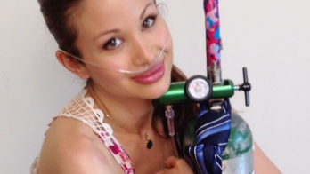 Singer reaches new heights with help of oxygen tank