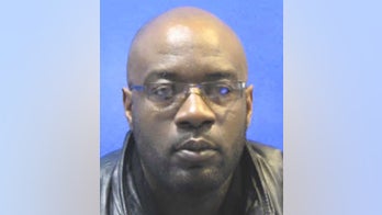 On the loose: Baltimore gunman accused of killing co-worker identified