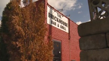 Cleveland bar customers fight back during armed robbery