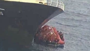 Dozens rescued from sinking fishing boat off Alaska