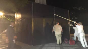 Birmingham, mayor sued for covering Confederate monument