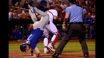 Watch Toronto Blue Jays' Chris Coghlan fly over catcher to avoid tag