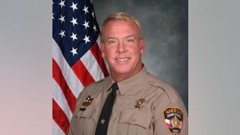Police hunt suspects after Texas sheriff's deputy shot, killed in his home