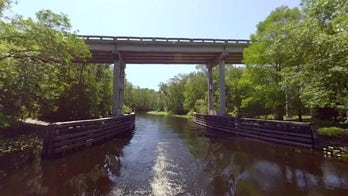 Driver falls 70 feet from window while escaping his crashed car on bridge