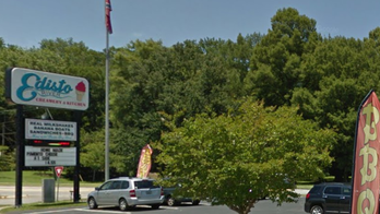 Confederate flag can't be removed from lawn of ice cream shop, despite owner's wishes